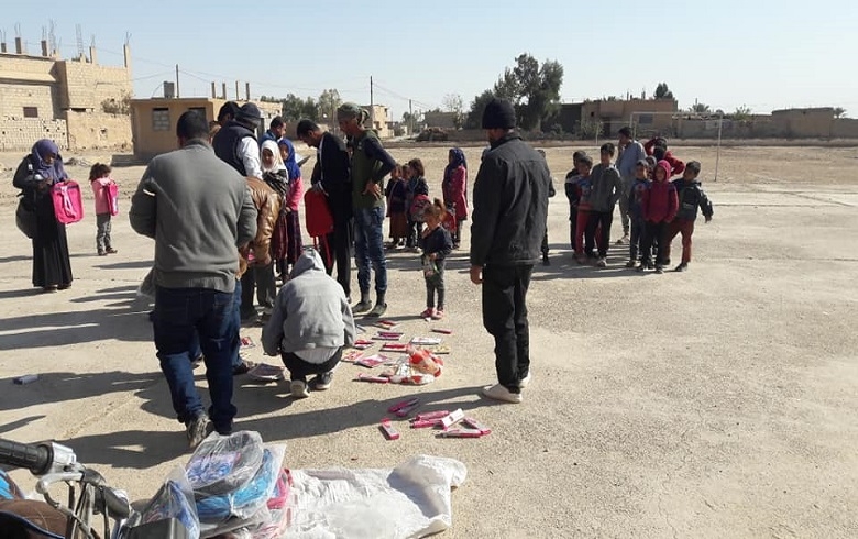 Distribution of Bags along some Notebooks and Pens to Orphan Students